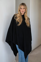 V-Neck Travel Poncho in Black - 100% cashmere poncho with ribbed edges
