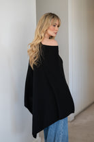 V-Neck Travel Poncho in Black - 100% cashmere poncho with ribbed edges